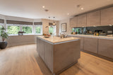Modern kitchen with Driftwood Jetsum Oak wood floors installed