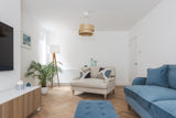Deco Shore Drift Oak herringbone wood floors in a modern living room
