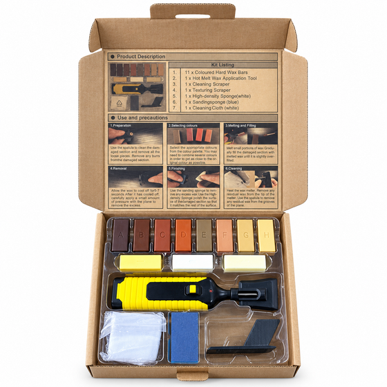 Open wood floor repair kit containing 11 wax blocks, a melting tool, scrapers, sponges and cloth.